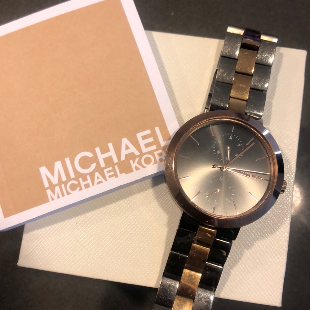 Black and gold Michael kors watch